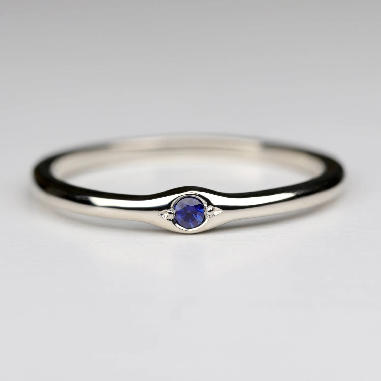 2mm Bump Ring with a Dark Blue Sapphire